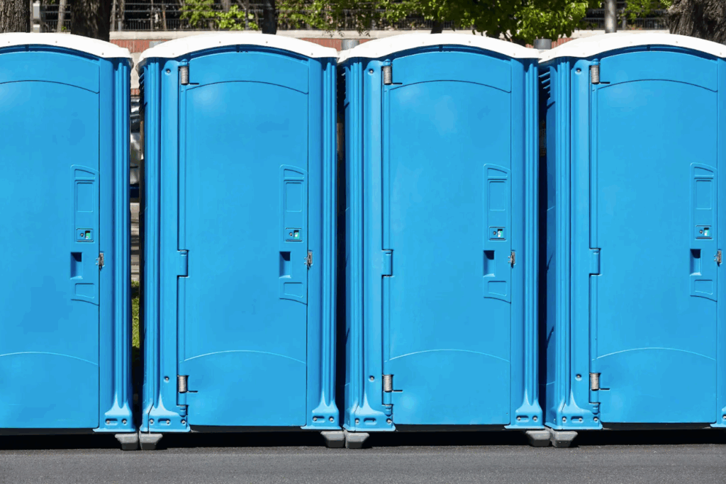 Portable toilets ready for cleanup and maintenance